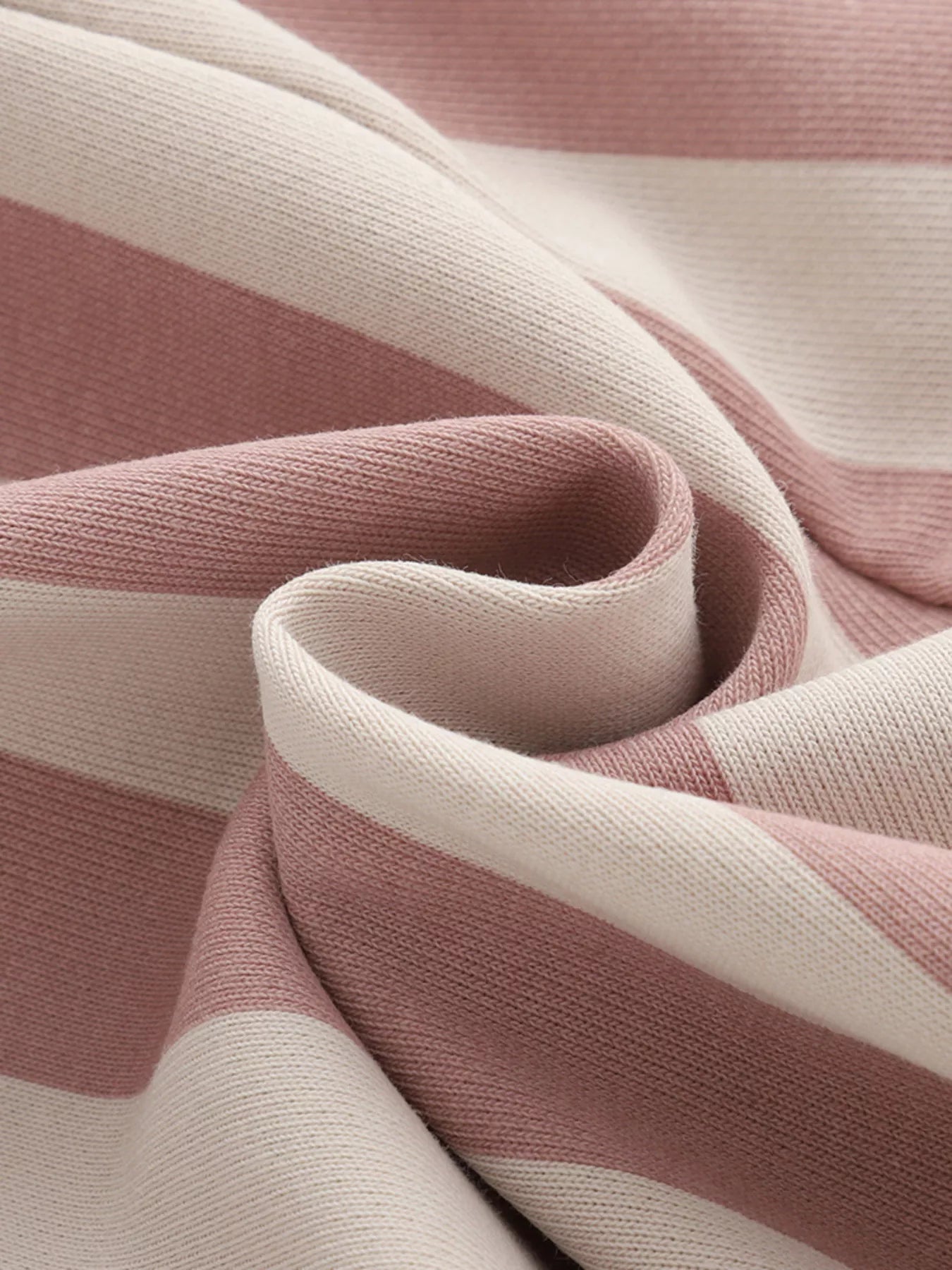 Close-up of pink and beige striped fabric