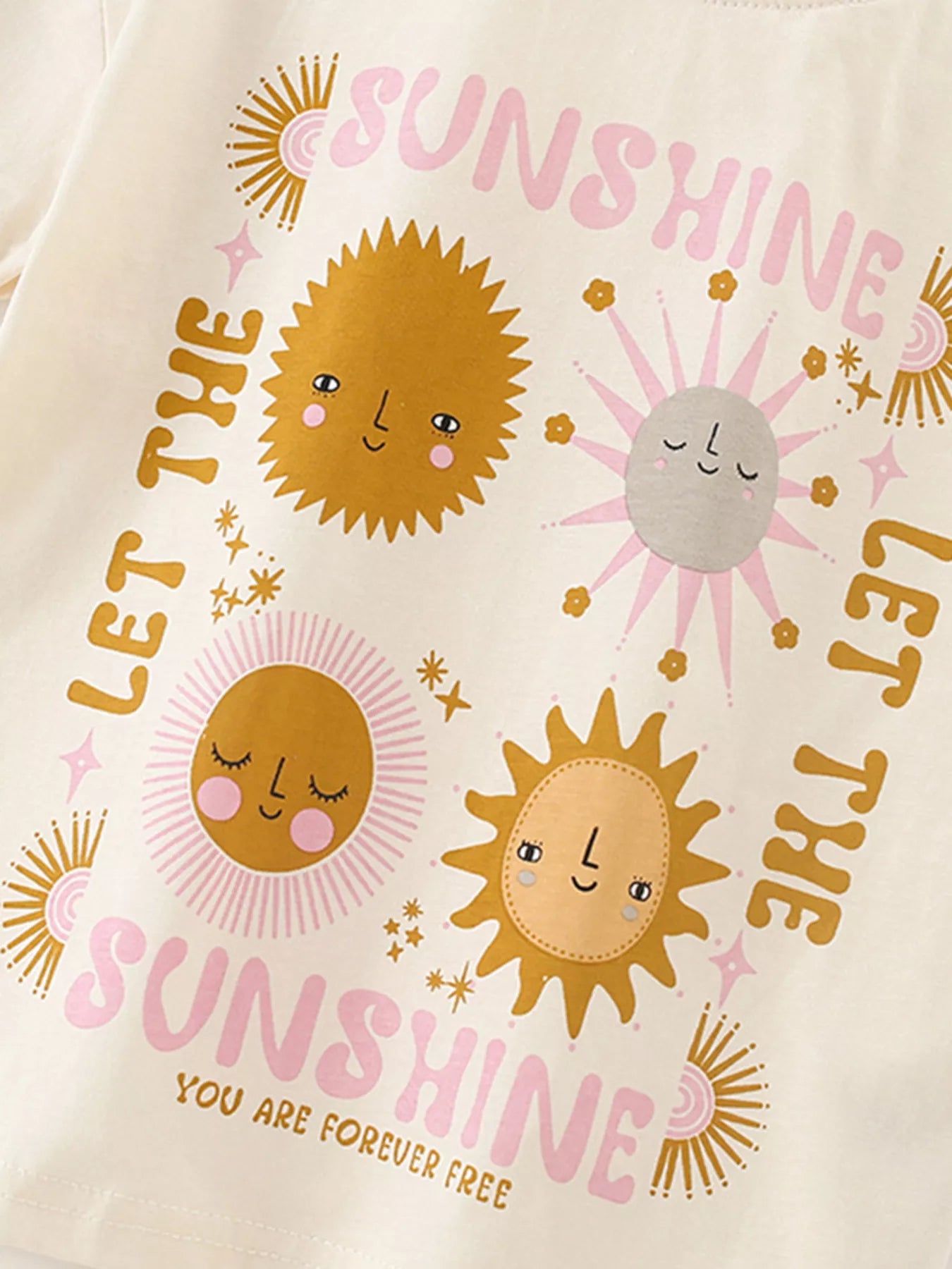 Children's blanket with sun designs and text on a white background