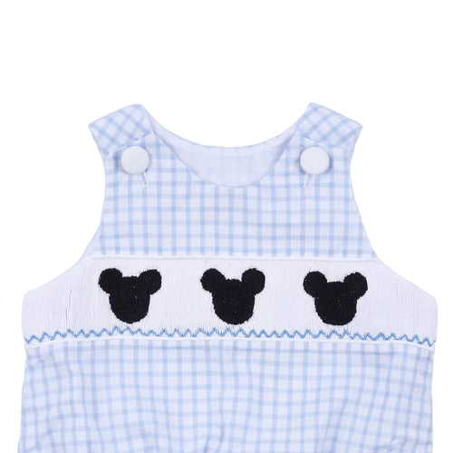 Baby romper with blue checkered pattern and black mouse ears on a white background