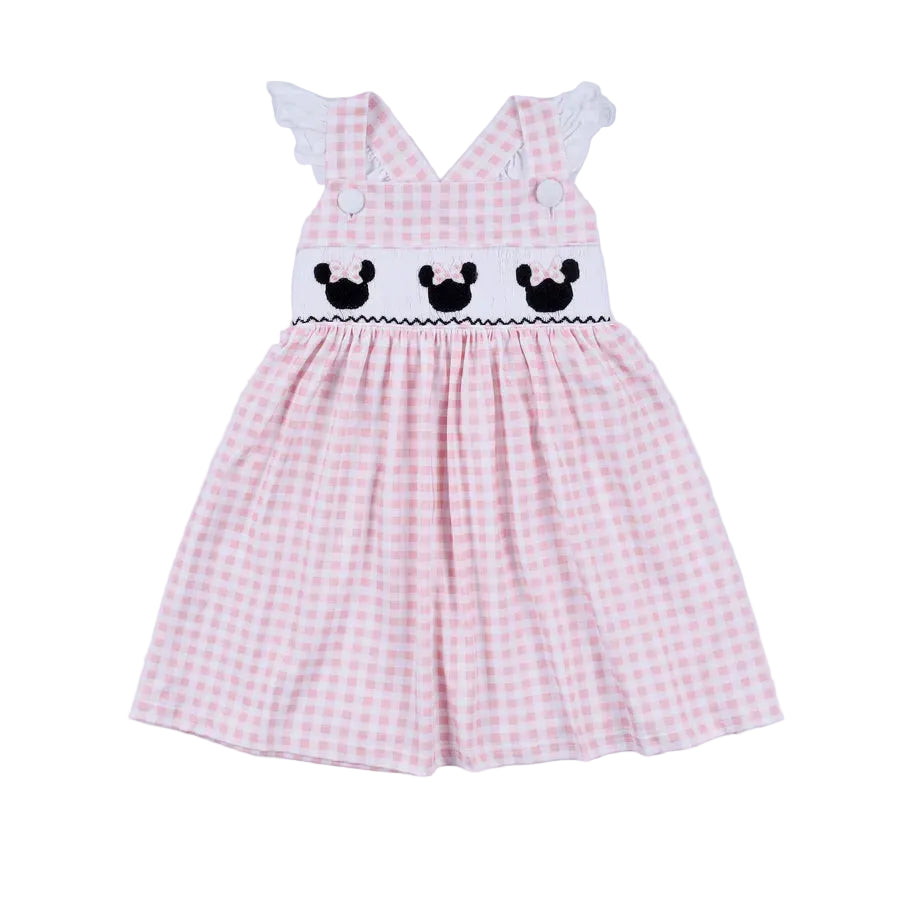Pink gingham dress with black mouse ears design on a light gray background
