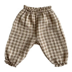 Plaid baby pants on a white background