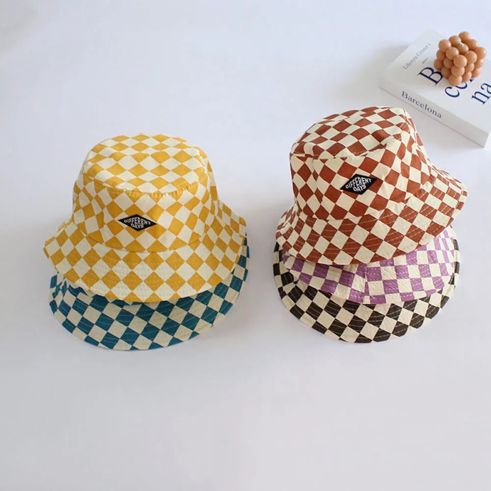 Two checkered bucket hats on a white background