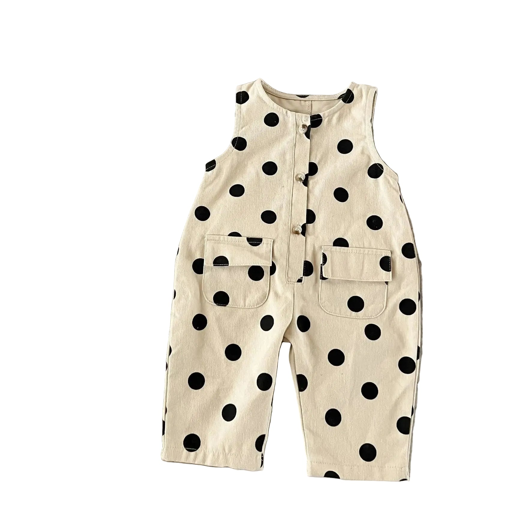 Beige overalls with black polka dots on a white background