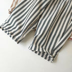 Close-up of a black and white striped fabric on a white background