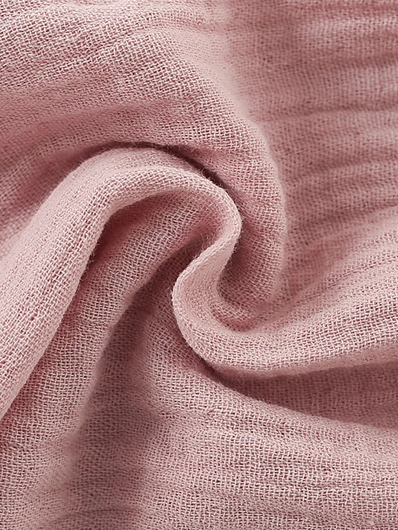 Close-up of pink fabric with a soft texture